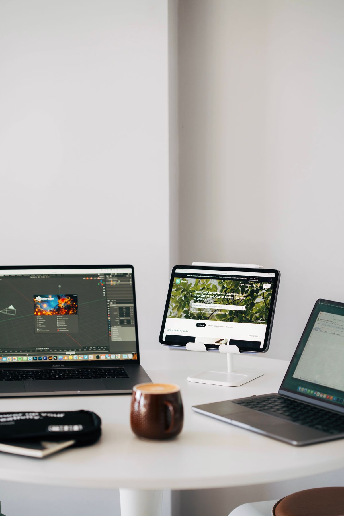 Multiple devices showing different software tools side by side